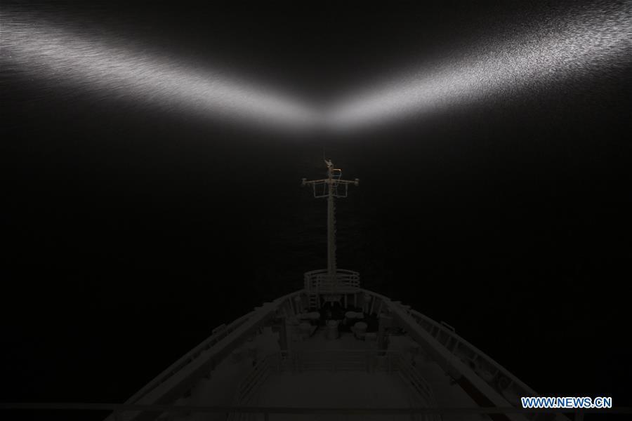 China\'s research icebreaker Xuelong, or Snow Dragon, works against blizzard on the Amundsen Sea during the country\'s 34th Antarctic expedition, March 21, 2018. The living and working scenes of Chinese people in the past year have created a series of amazing views, some of which formed geometric figures. Those photos tell the development and progress of the country in 2018. (Xinhua/Bai Guolong)