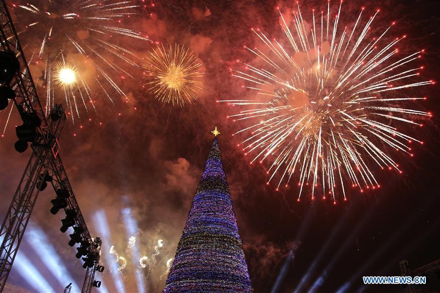 Photo taken on Dec. 21, 2018 shows the lit-up Christmas tree at the downtown Republic Square, heralding the start of New Year celebrations, in Yerevan, Armenia. (Xinhua/Gevorg Ghazaryan)