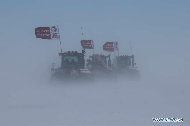<?php echo strip_tags(addslashes(Two inland expedition teams of Chinese researchers on China's 35th Antarctic expedition encounter a blizzard on their way to China's Kunlun and Taishan stations in Antarctica, Dec. 21, 2018. (Xinhua/Liu Shiping))) ?>