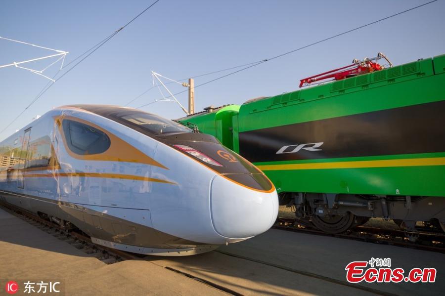 <?php echo strip_tags(addslashes(The China Railway S&T Innovation Achievement Exhibition opens at China National Railway Test Centre in Beijing, Dec. 24, 2018. The exhibition showcases China's homegrown railway technology and equipment, displaying the Fuxing, or Rejuvenation, bullet trains in various configurations. Entirely designed and manufactured in China, today's Fuxing trains are more spacious and energy efficient, with a longer service life and better reliability than previous models. The exhibition includes the 17-car version that runs up to 350 kilometers an hour, an eight-car version that runs at 250 kilometers per hour and trains with a designed speed of 160 kilometers an hour. (Photo/IC))) ?>