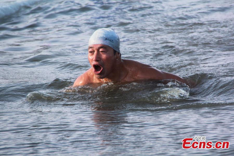An international winter swimming invitational competition held in Hailar District, Hulunbuir City, North China’s Inner Mongolia Autonomous Region, Dec. 25, 2018. Hailar has hosted the event, China’s northernmost and lowest-temperature swimming competition, for five times, attracting over 100 participants from China and Russia this year. (Photo: China News Service/Li Rui)