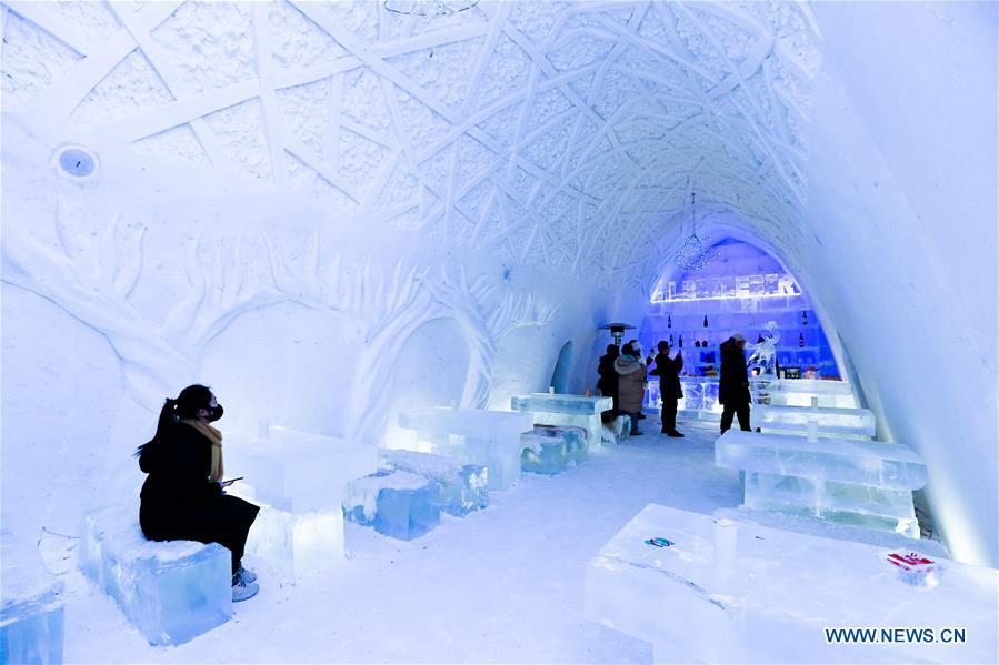 Photo taken on Dec. 25, 2018 shows the interior of an ice and snow hotel in Hailar of Hulun Buir, north China\'s Inner Mongolia Autonomous Region. The hotel, made from 8,000 tons of ice and snow, attracts many tourists. (Xinhua/Yu Dongsheng)