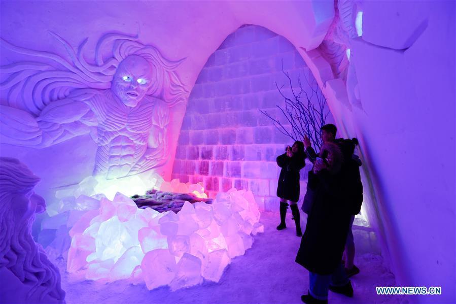 Photo taken on Dec. 25, 2018 shows the interior of an ice and snow hotel in Hailar of Hulun Buir, north China\'s Inner Mongolia Autonomous Region. The hotel, made from 8,000 tons of ice and snow, attracts many tourists. (Xinhua/Yu Dongsheng)