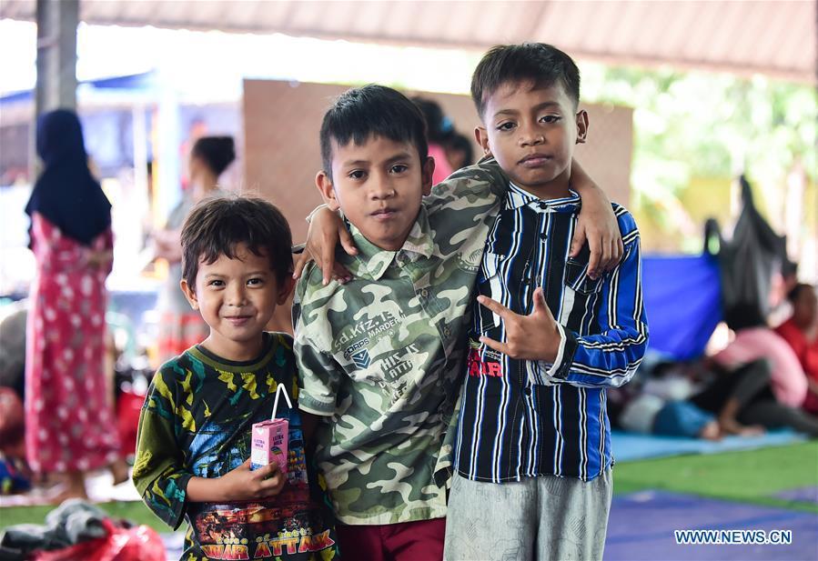Children are seen at a temporary shelter in Labuan of Pandeglang in Banten Province, Indonesia, Dec. 25, 2018. Casualty from the tsunami triggered by a volcanic eruption in Sunda Strait in Indonesia climbed to 429 people, and 16,802 others were displaced. (Xinhua/Du Yu)