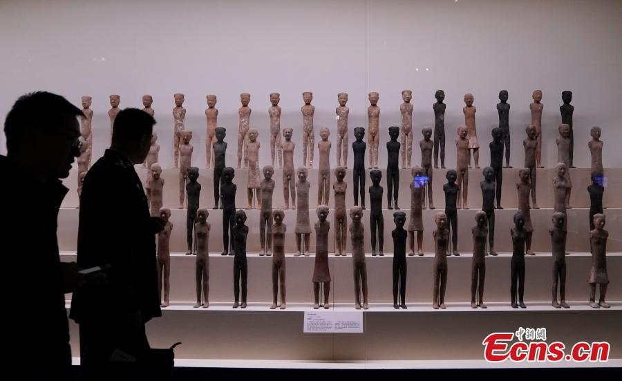 Cultural relics retrieved after being stolen from ancient tombs in Chunhuan County, Shaanxi Province are on display at an exhibition at the National Museum of China in Beijing, Dec. 26, 2018. The exhibition displays 750 precious artifacts retrieved during police efforts in recent years fighting crime involving stolen cultural treasures, which hail from Neolithic times through to the Qing Dynasty. (Photo: China News Service/Du Yang)