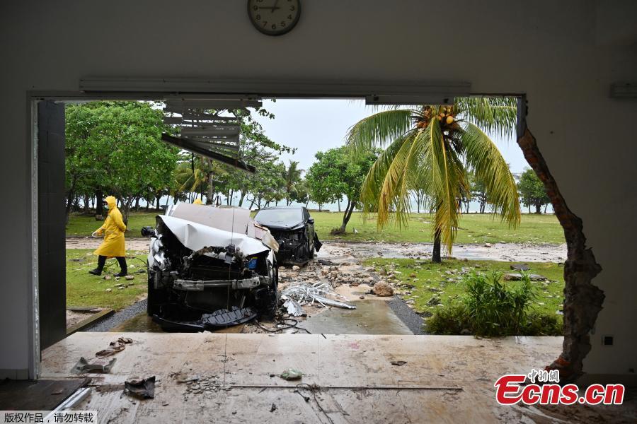 Debris is seen along a beach after a tsunami, near Sumur, Banten province, Indonesia, Dec. 26, 2018. Indonesian rescue teams on Wednesday struggled to reach remote areas on the western coast of Java amid an \