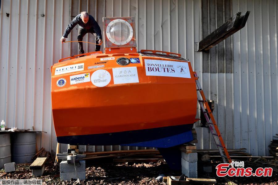 Jean-Jacques Savin, a former paratrooper, 71, works on the construction of a ship made from a barrel on Nov. 15, 2018 at the shipyard in Ares, southwestern France. The Frenchman has embarked on an epic journey across the Atlantic on a barrel-shaped capsule heading towards the Caribbean. (Photo/Agencies)