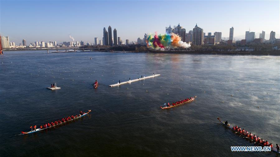 <?php echo strip_tags(addslashes(Teams of participants compete during a winter dragon boat race in Jilin City, northeast China's Jilin Province, Dec. 28, 2018. A total of 15 teams from home and abroad participated in the race on Friday. (Xinhua/Zhu Dapeng))) ?>