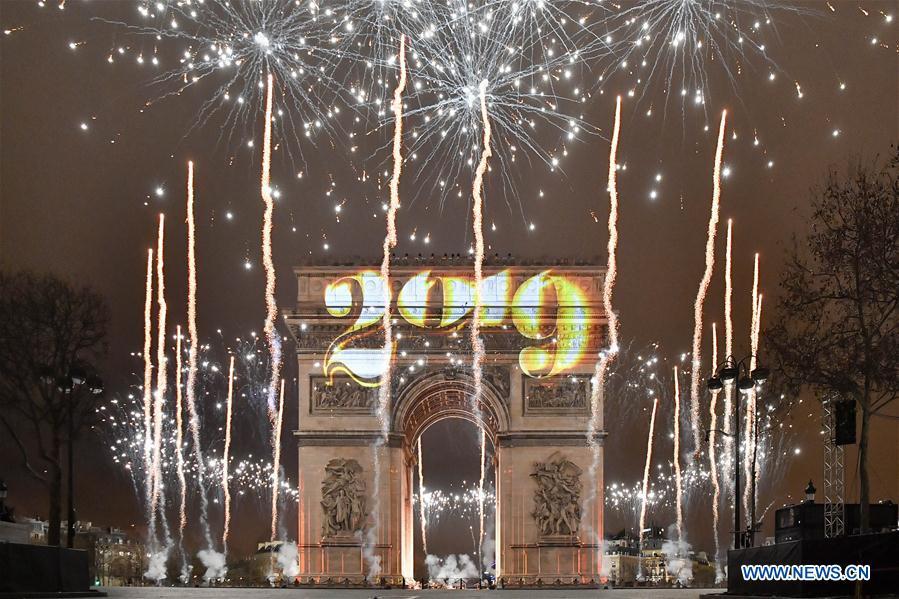 A fireworks display is seen at the Arc de Triomphe (Triumphal arch) in Paris, France, Jan. 1, 2019. (Xinhua/Chen Yichen)