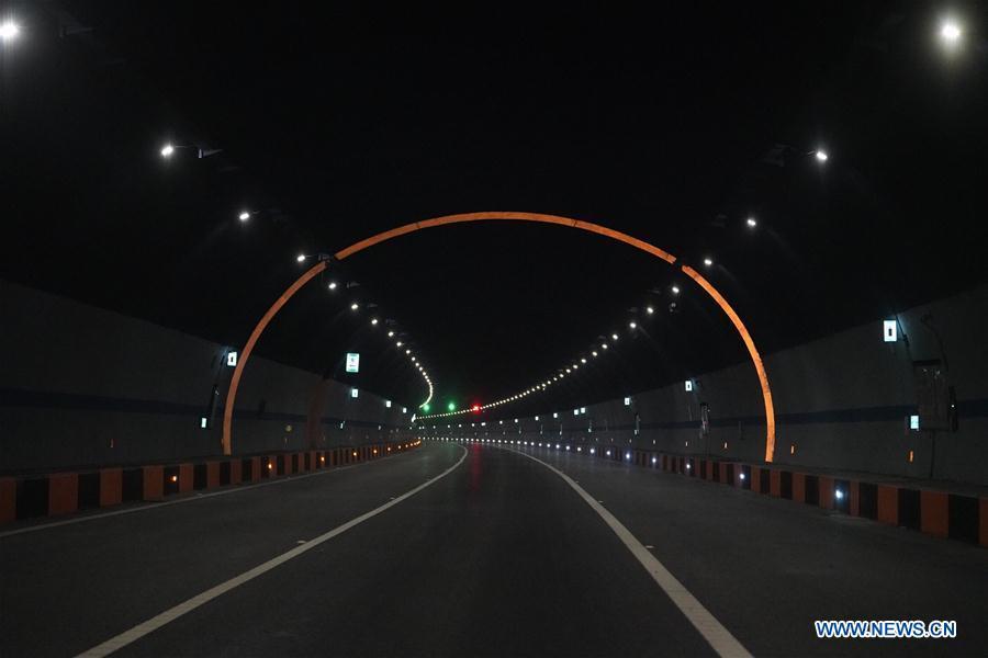 Photo taken on Jan. 1, 2019 shows Shixia Tunnel of the Xinglongkou-Yanqing section of Beijing-Chongli Expressway, which gets through Beijing\'s Changping district and Yanqing district, in Beijing, capital of China. After more than three years\' construction work, the 42.2-km-long Xinglongkou-Yanqing section of Beijing-Chongli Expressway linking northwest Beijing\'s Xinglongkou Village in Changping district and Yanqing district opened to traffic on Tuesday. Beijing-Chongli Expressway starts from Beijing and ends at Chongli of north China\'s Hebei Province. It will serve the Beijing International Horticultural Exhibition 2019 and the Beijing 2022 Winter Games, which are to be held in Yanqing and Chongli respectively. (Xinhua/Xing Guangli)