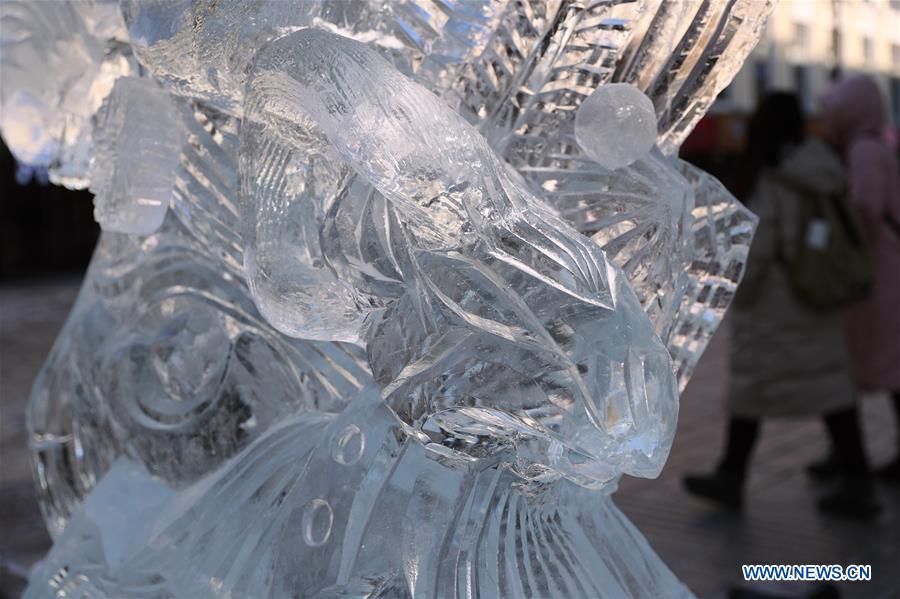 An ice sculpture is displayed on the Zhongyang Street during a national college ice sculpture competition in Harbin, capital of northeast China\'s Heilongjiang Province, Jan. 2, 2019. (Xinhua/Cao Jiyang)