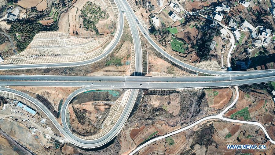 <?php echo strip_tags(addslashes(Aerial photo taken on Jan. 3, 2019 shows a part of the Liupanshui-Weining Highway in southwest China's Guizhou Province. The Liupanshui-Weining Highway with a highest altitude of 2,260 meters, the highest highway in the province, opened to traffic on Thursday. (Xinhua/Tao Liang))) ?>