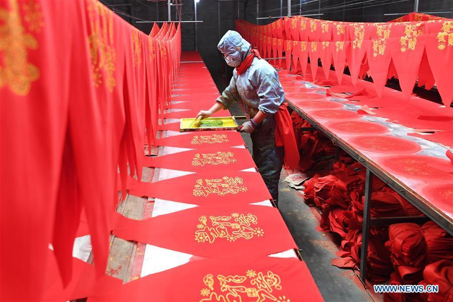 <?php echo strip_tags(addslashes(A villager works in a lantern workshop for the upcoming peak sales season of Spring Festival in Jifeng Town of Jishan County in Yuncheng, north China's Shanxi Province, Jan. 3, 2019. (Xinhua/Yang Chenguang))) ?>