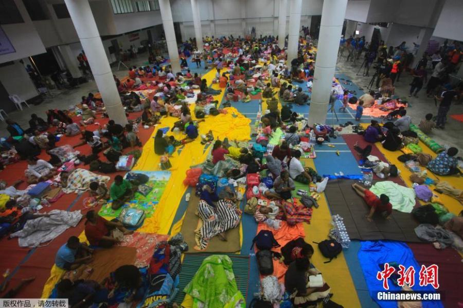 <?php echo strip_tags(addslashes(Thai people are settled at an evacuation center in Nakhon Si Thammarat province, Thailand, Thursday, Jan. 3, 2019. Thai weather authorities are warning that a tropical storm will bring heavy rain and high seas to southern Thailand and its famed beach resorts. (Photo/Agencies))) ?>