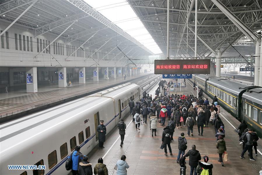 Passengers exit the Nanjing Railway Station in Nanjing, capital of east China\'s Jiangsu Province, Jan. 4, 2019. China will put into use the new train diagram starting from Jan. 5.(Xinhua/Xu Congjun)