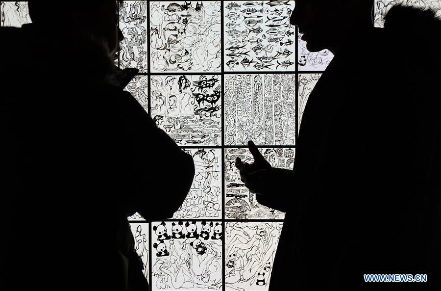 <?php echo strip_tags(addslashes(Visitors view Han Meilin's Chinese Zodiac Art Exhibition in Beijing, capital of China, Jan. 5, 2019. The Chinese Zodiac Art Exhibition, displaying the fine arts of Chinese artist Han Meilin, kicked off in the Palace Museum on Saturday and will last until Feb. 20, 2019. (Xinhua/Li He))) ?>