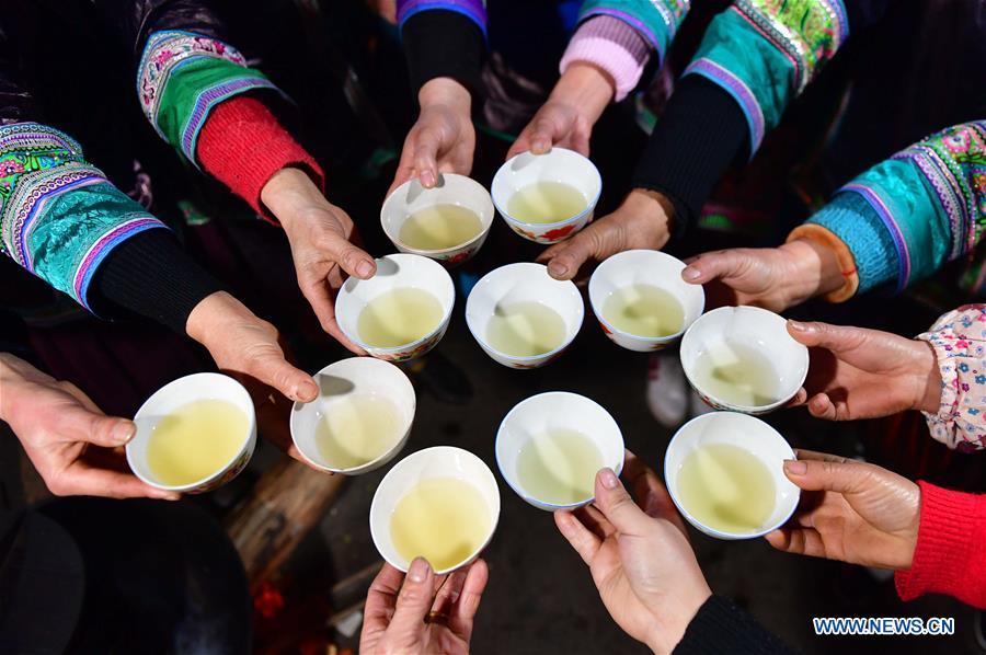 <?php echo strip_tags(addslashes(Villagers drink wine to wish for good luck during a get-together in Rongshui, Liuzhou City of south China's Guangxi Zhuang Autonomous Region, Jan. 5, 2019. Local Miao people celebrated their traditional New Year in various ways. (Xinhua/Huang Xiaobang))) ?>