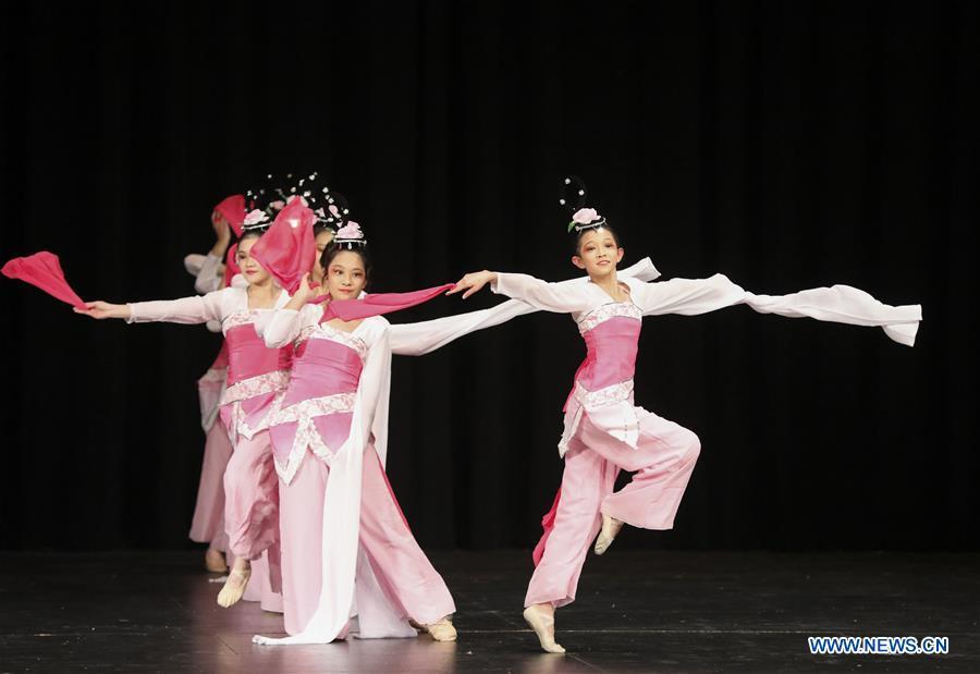 Students from the Chunhui Chinese School perform a classic Chinese dance during a New Year celebration organized by Greater Philadelphia Chinese School of Union (GPCSU) in Philadelphia, the United States, on Jan. 6, 2019. More than 100 young Chinese Americans have charmed fans of traditional Chinese folk dances and costumes in a grand New Year celebration performance. (Xinhua/Wang Ying)