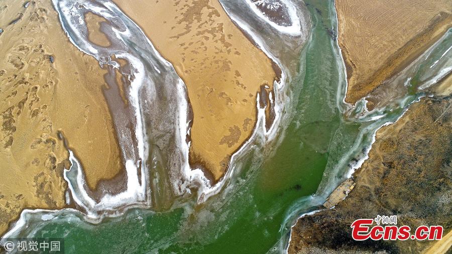 An aerial view of the frozen branches of the Yellow River in Yuncheng City, North China\'s Shanxi Province. (Photo/VCG)