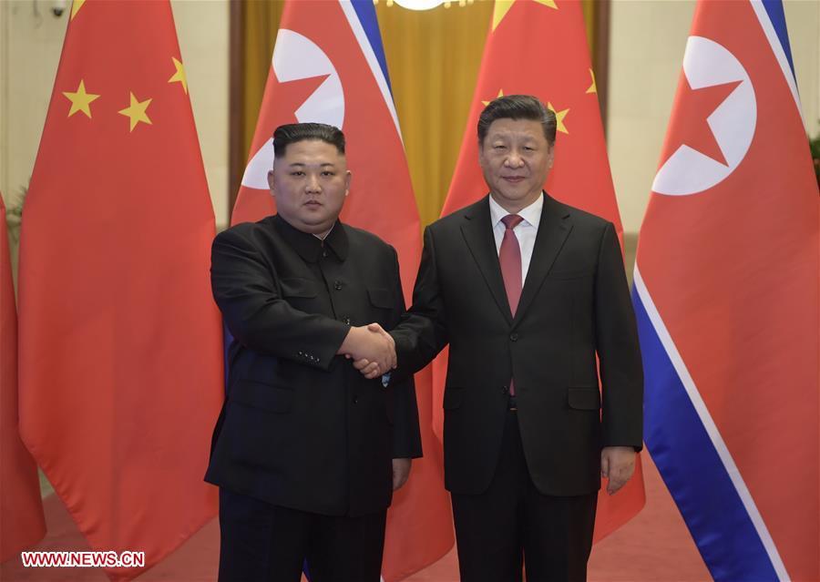 Xi Jinping (R), general secretary of the Central Committee of the Communist Party of China and Chinese president, holds a welcoming ceremony for Kim Jong Un, chairman of the Workers\' Party of Korea and chairman of the State Affairs Commission of the Democratic People\'s Republic of Korea, before their talks at the Great Hall of the People in Beijing, capital of China, Jan. 8, 2019. Xi Jinping on Tuesday held talks with Kim Jong Un, who arrived in Beijing on the same day for a visit to China. (Xinhua/Li Xueren)