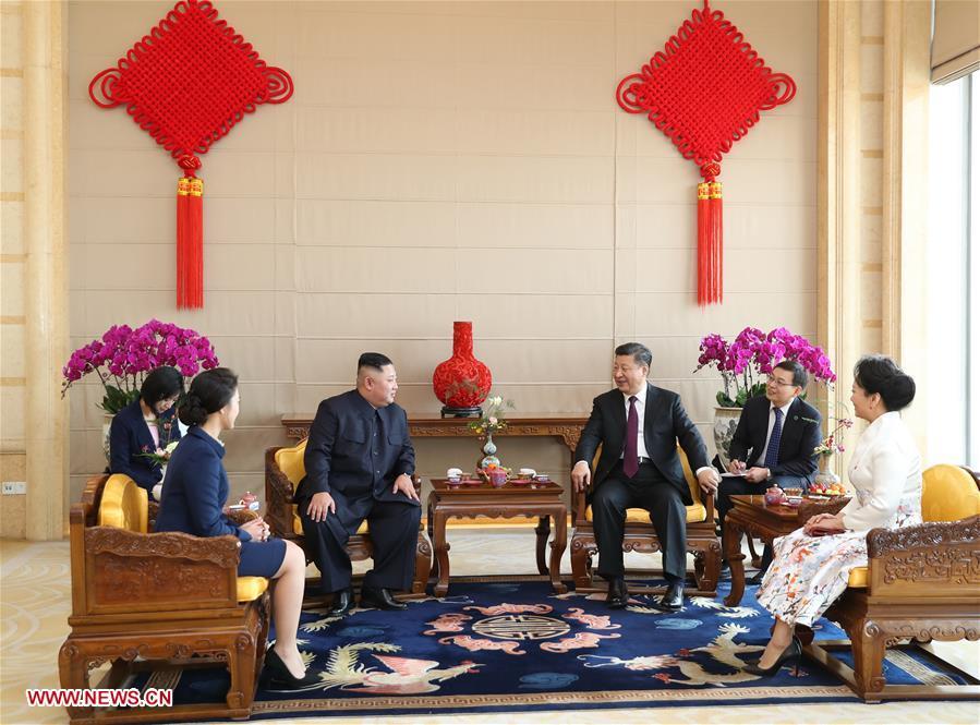 Xi Jinping, general secretary of the Central Committee of the Communist Party of China and Chinese president, holds a welcoming ceremony for Kim Jong Un, chairman of the Workers\' Party of Korea and chairman of the State Affairs Commission of the Democratic People\'s Republic of Korea, before their talks at the Great Hall of the People in Beijing, capital of China, Jan. 8, 2019. Xi Jinping on Tuesday held talks with Kim Jong Un, who arrived in Beijing on the same day for a visit to China. (Xinhua/Shen Hong)