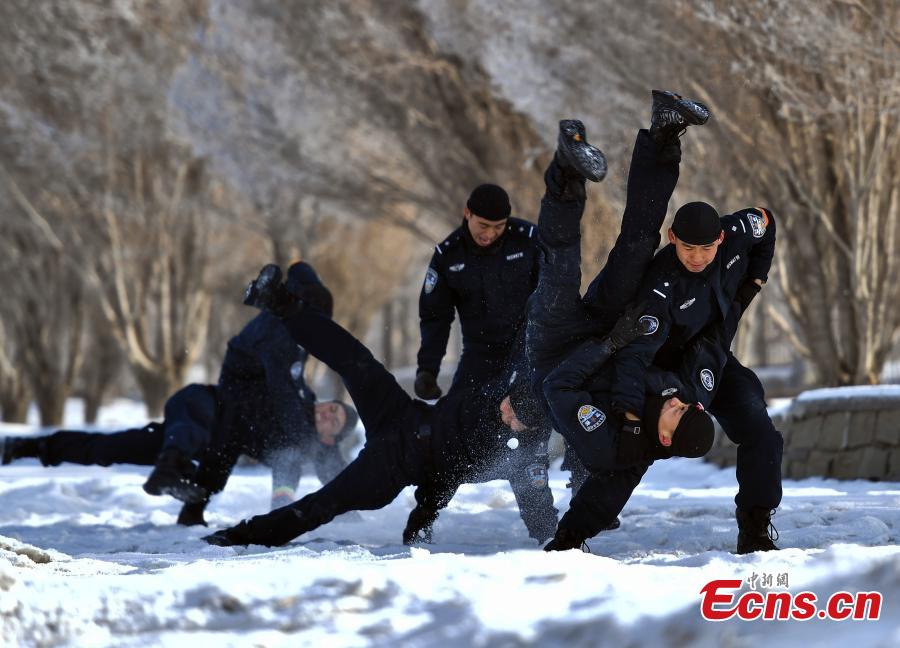 <?php echo strip_tags(addslashes(Members of the special police force of Urumqi City, Northwest China's Xinjiang Uygur Autonomous Region, undergo an intensive training at a snow field in freezing conditions, Jan. 9, 2019. The 60-plus day winter training included running, the use of police equipment and combat skills. (Photo: China News Service/Liu Xin))) ?>