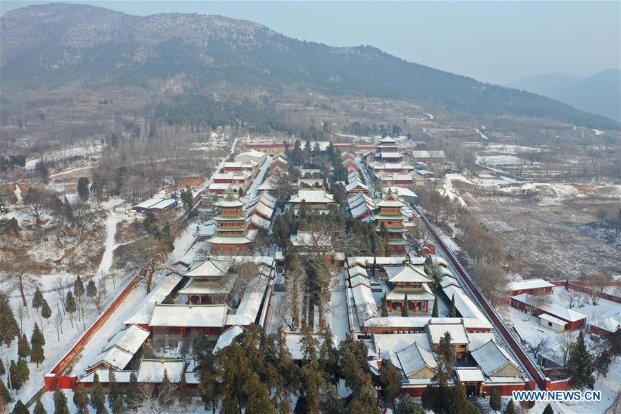 Aerial photo taken on Jan. 10, 2019 shows the snow-covered Shaolin Temple in Dengfeng City, central China\'s Henan Province. (Xinhua/Feng Dapeng)