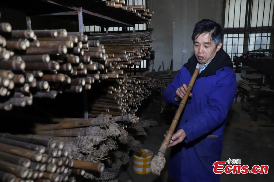 <?php echo strip_tags(addslashes(Wu Jihong, an inheritor of the Yuping bamboo -flute making craft, works to make a flute in Yuping Dong Autonomous County, Southwest China's Guizhou Province, Jan. 10, 2019. As a traditional Chinese bamboo instrument, the Yuping bamboo flute is famous for its clear tone and delicate carving. Made from local bamboo, the flute undergoes dozens of procedures before it is finished and merges folk cultures of several ethnic groups. It was listed as one of the National Intangible Cultural Heritages in 2006. (Photo: China News Service/Qu Honglun))) ?>