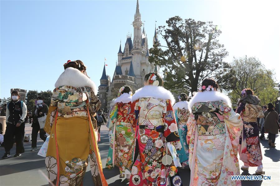 Japanese girls in kimonos celebrate Coming of Age together at Tokyo Disneyland in Chiba, Japan, Jan. 14, 2019. People who turned 20-year-old took part in the annual Coming of Age Day ceremony in Japan on Monday. (Xinhua/Du Xiaoyi)