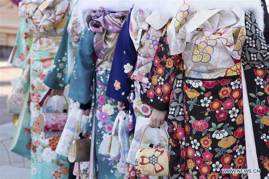 Japanese girls in kimonos celebrate Coming of Age together at Tokyo Disneyland in Chiba, Japan, Jan. 14, 2019. People who turned 20-year-old took part in the annual Coming of Age Day ceremony in Japan on Monday. (Xinhua/Du