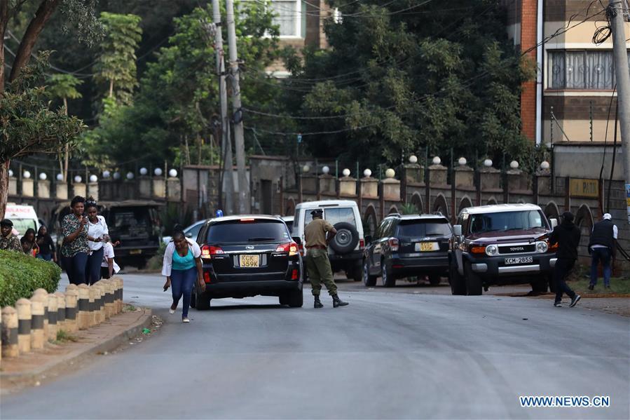 Security forces stand guard near the site of an attack at an upmarket hotel and office complex in Nairobi, Kenya, on Jan. 15, 2019. At least six people have been confirmed dead and several others injured following an attack at an upmarket hotel and office complex in Nairobi on Tuesday, police said. (Xinhua/Wang Teng)