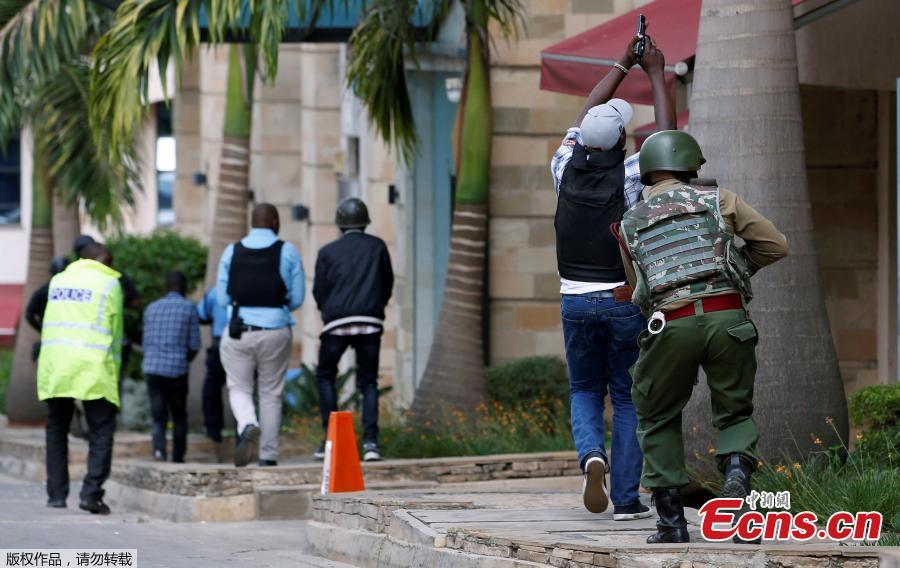 Security forces stand guard near the site of an attack at an upmarket hotel and office complex in Nairobi, Kenya, on Jan. 15, 2019. At least six people have been confirmed dead and several others injured following an attack at an upmarket hotel and office complex in Nairobi on Tuesday, police said.  (Photo/Agencies)