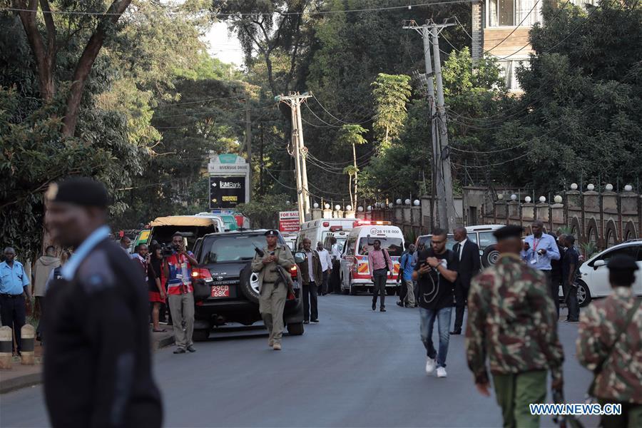 Security forces gather near the site of an attack at an upmarket hotel and office complex in Nairobi, Kenya, on Jan. 15, 2019. At least six people have been confirmed dead and several others injured following an attack at an upmarket hotel and office complex in Nairobi on Tuesday, police said. (Xinhua/Lyu Shuai)