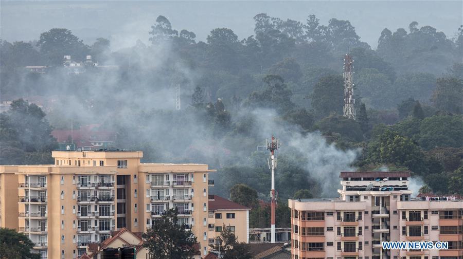 Smoke rises from the blast area after an attack at an upmarket hotel and office complex in Nairobi, Kenya, on Jan. 15, 2019. At least six people have been confirmed dead and several others injured following an attack at an upmarket hotel and office complex in Nairobi on Tuesday, police said. (Xinhua/Zhang Yu)