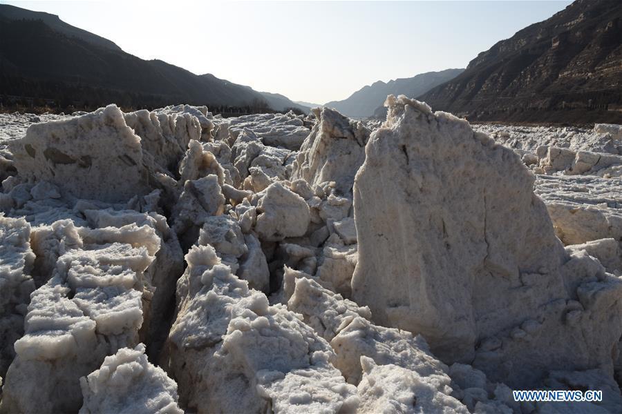 <?php echo strip_tags(addslashes(Photo taken on Jan. 16, 2019 shows the ice at the Hukou Waterfall on the Yellow River in Hukou Town of Jixian County in Linfen City, north China's Shanxi Province. More than 70 kilometers of the Yellow River's Hukou section were covered with ice due to lasting low temperatures. (Xinhua/Lyv Guiming))) ?>