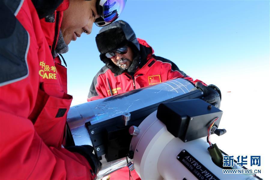 Members of China\'s 35th Antarctic scientific expedition team install and test the KL-DIMM telescope for Kunlun Station at Dome A, Antarctica, Jan. 16, 2019. (Photo/Xinhua)