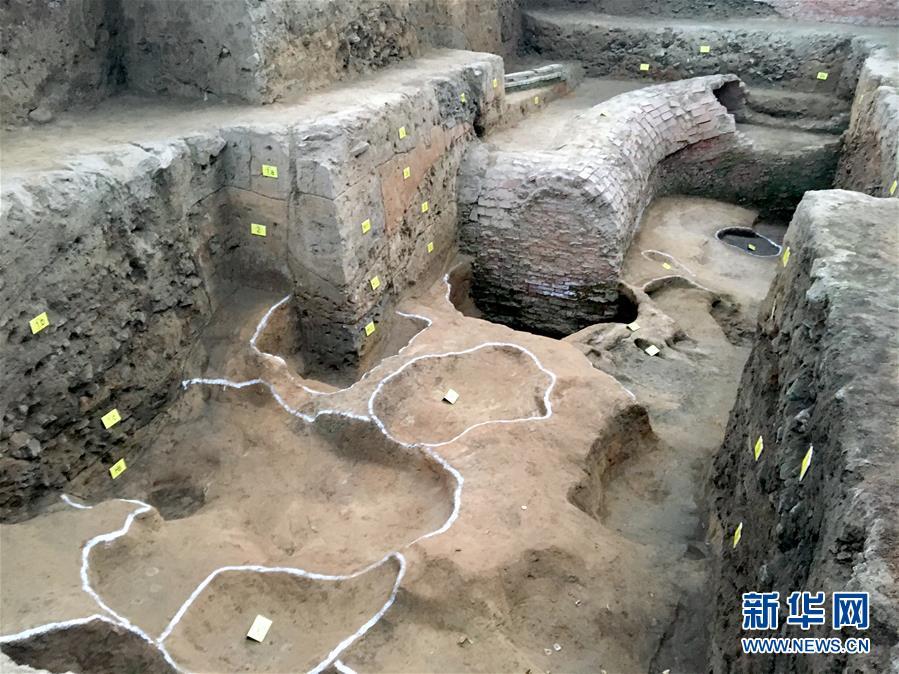 A view of an excavation site at a museum in Nanyang City, Central China\'s Henan Province, Jan. 15, 2019. The museum was built at the site of a former government office in feudal China, used by local magistrates in three dynasties. Excavation at the site started in 2017 when rainstorms exposed a ceramic mould used to make coins. Excavation work over two years has uncovered more coins and moulds that date back to Wang Mang, the founder of the short-lived Xin dynasty (AD 9?25). Bai Yunxiang, a researcher with the Chinese Academy of Social Sciences said the findings provided precious historical materials for studying the coin casting industry in the Qin and Han dynasties and the social and economic system in Wang Mang\'s reign. (Photo: China News Service/Li Wenzhe)
