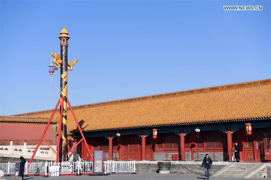 <?php echo strip_tags(addslashes(A heavenly lantern is installed before the Qianqing Gong, or the Palace of Heavenly Purity, at the Palace Museum, also known as the Forbidden City, in Beijing, capital of China, Jan. 21, 2019. The traditional lanterns recovered by the Palace Museum in accordance with historical archives from the Qing Dynasty (1644-1911) are opened to the public Monday, as a part of the exhibition of 