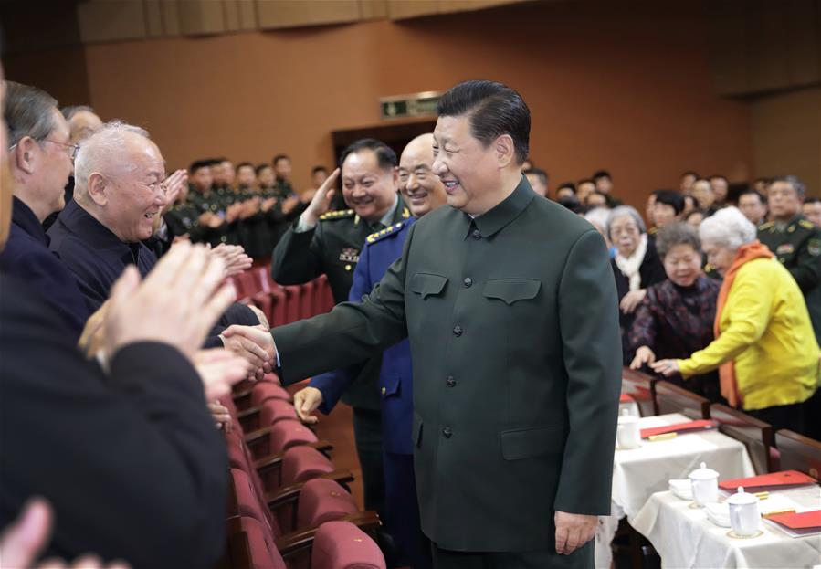 Chinese President Xi Jinping, also general secretary of the Communist Party of China Central Committee and chairman of the Central Military Commission, shakes hands with the retirees during a gala for retired military officials with Beijing-based troops in Beijing, capital of China, on Jan. 22, 2019. Xi extended his Spring Festival greetings to military veterans and retired military officials. (Xinhua/Li Gang)