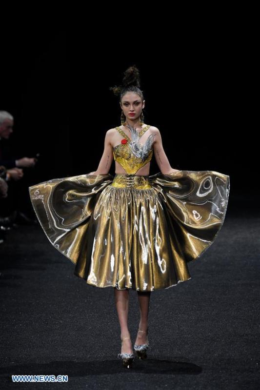 A model presents a creation of Guo Pei during the Haute Couture 2019 Spring/Summer collection shows in Paris, France, on Jan. 23, 2019. (Xinhua/Piero Biasion)