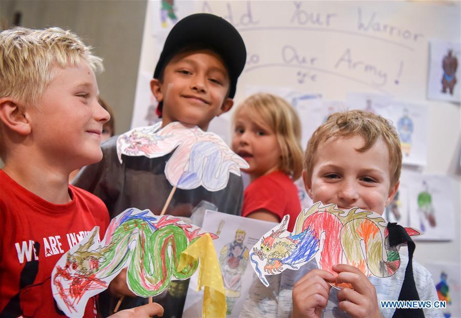 Children show their decorated Chinese dragons in Te Papa, the national museum of New Zealand in Wellington, New Zealand, Jan. 23, 2019. A family event, with a theme on \
