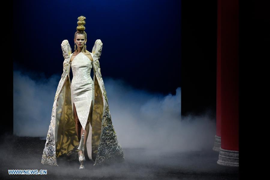 A model presents a creation of Guo Pei during the Haute Couture 2019 Spring/Summer collection shows in Paris, France, on Jan. 23, 2019. (Xinhua/Piero Biasion)