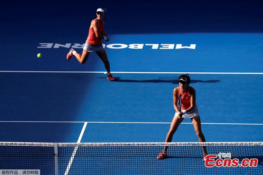 <?php echo strip_tags(addslashes(Zhang Shuai of China and Samantha Stosur of Australia compete during the women's doubles final match against Timea Babos of Hungary and Kristina Mladenovic of France at 2019 Australian Open in Melbourne, Australia, Jan. 25, 2019. (Photo/Agencies))) ?>