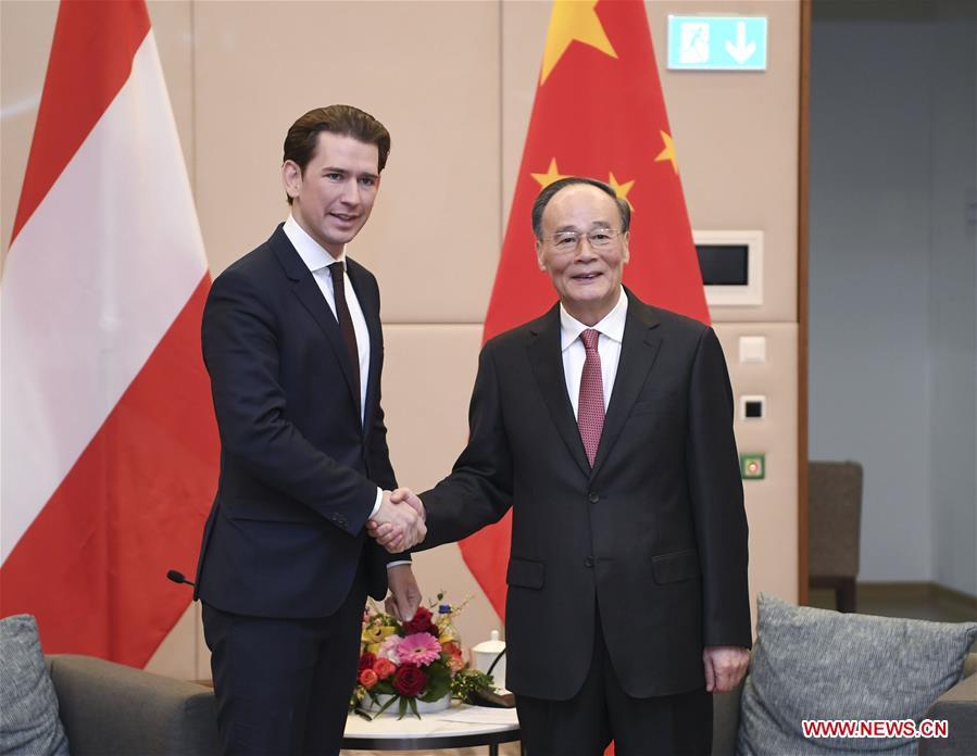 Chinese Vice President Wang Qishan (R) meets with Austrian Chancellor Sebastian Kurz during the 2019 Annual Meeting of the World Economic Forum in Davos, Switzerland. Wang delivered a speech titled \