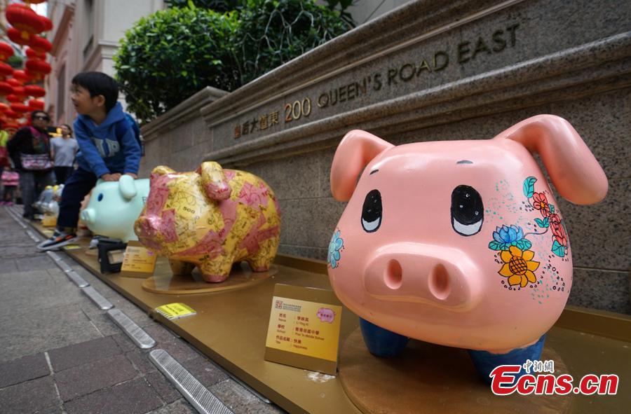 A piglet-themed art installment to promote the importance of saving money has been organized by the Hong Kong Deposit Protection Board and appears in an exhibition on Lee Tung Street in Hong Kong, Jan. 27, 2019. Hong Kong students and local artists designed 66 piglets for the exhibition. 2019 is the Year of the Pig. (Photo: China News Service/Zhang Wei)
