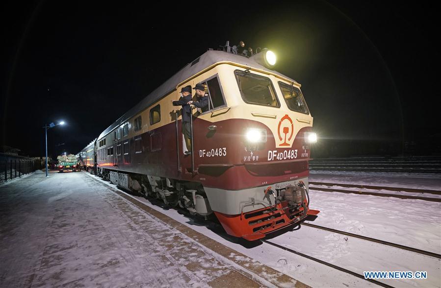 Drivers work on train No. 6245 which travels from Qiqihar to Gulian in northeast China\'s Heilongjiang Province, early on Jan. 23, 2019. Train No. 6245 is one of China\'s most economical railway trains which are bound for remote destinations. During China\'s Spring Festival travel season, these \