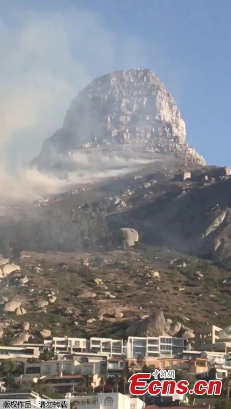 Smoke rises from a burning mountainside in Cape Town, South Africa, January 27, 2019, in this picture grab obtained from social media video.  (Photo/Agencies)