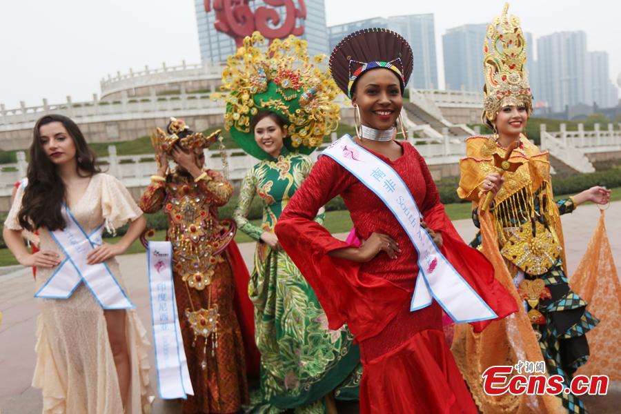 Contestants of the 53rd Miss All Nations Pageant brave the winter chill to pose for a photo in Nanjing, east China\'s Jiangsu Province, Jan. 28, 2019. The pageant will be held on Jan. 29 to promote Eco-Tourism. (Photo: China News Service/Yang Bo)