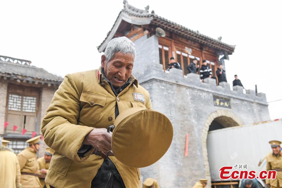 Li Tieliang, 69, works as extra in a TV drama being shot in Beishanyun Village in Yushe County, North China’s Shanxi Province, Jan. 24, 2019. The village has more than 30 well-preserved buildings from the Ming and Qing dynasties, making it a good location to shoot historical film and TV dramas. In recent years, many locals have migrated to other places, while some remaining farmers have found work as extras. Li and his wife survive by farming, while their children work in other cities. Li now works part-time as an extra and earns about 100 yuan ($14) a day. (Photo: China News Service/Wu Junjie)