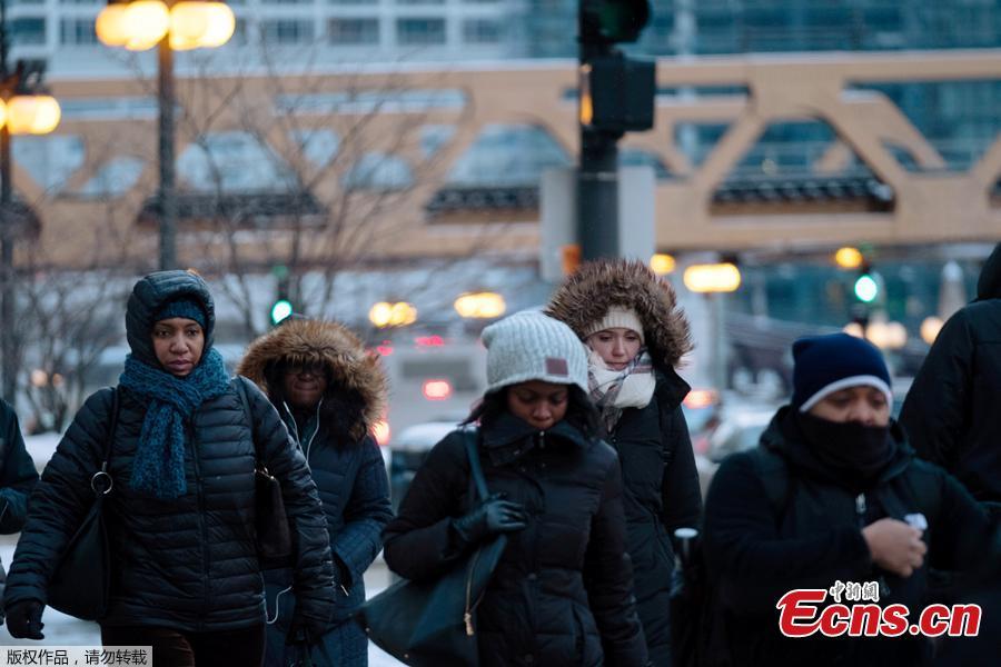 Pedestrians cross the street at rush hour, as bitter cold phenomenon called the polar vortex has descended on much of the central and eastern United States, in Chicago, Illinois, U.S., January 29, 2019.  (Photo/Agencies)